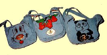 Big Girl and Little Girl suede purses with animal faces painted or drawn on flap